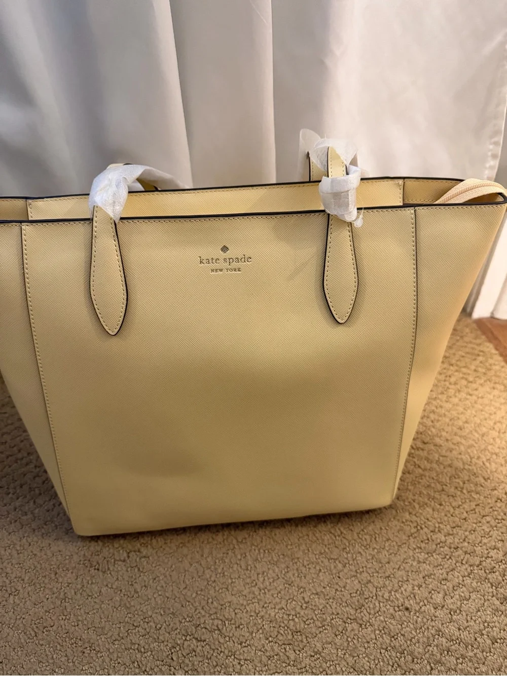Kate Spade butter yellow tote with blue-green floral charm NWT